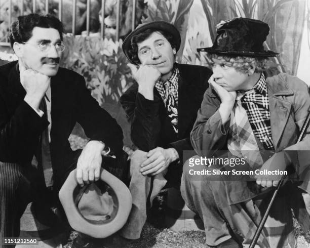 American comedy act the Marx Brothers, circa 1935. From left to right, Groucho, Chico and Harpo Marx.