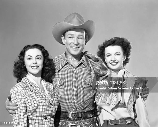 American actor and singer Roy Rogers with his wife, actress Dale Evans and Cuban actress Estelita Rodriguez , circa 1950.