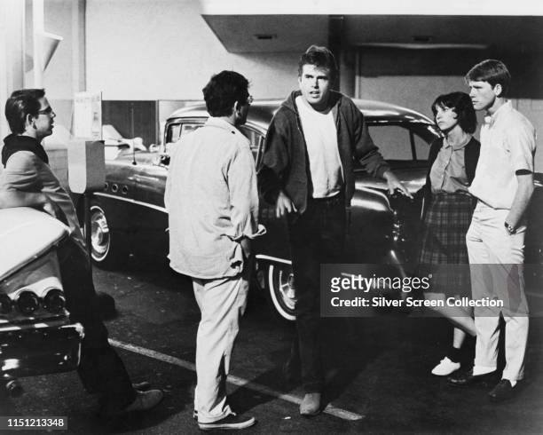 From left to right, actors Charles Martin Smith, Richard Dreyfuss, Paul Le Mat, Cindy Williams and Ron Howard in a scene from the film 'American...