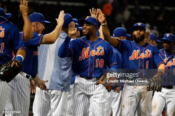 Rajai Davis of the New York Mets celebrates with teammates after defeating the Washington Nationals during their game at Citi Field on May 22, 2019...