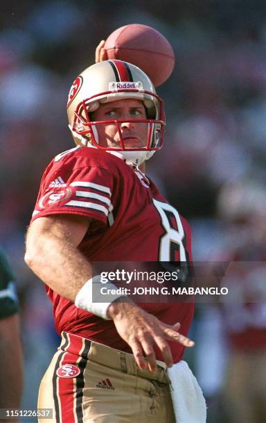 San Francisco 49ers Pro-Bowl quarterback Steve Young warms up before an exhibition game against the San Diego Chargers 12 August, 1999 in San...