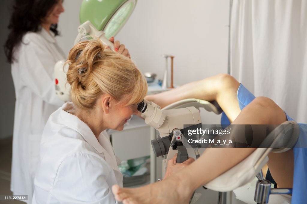Gynaecologist examining a patient