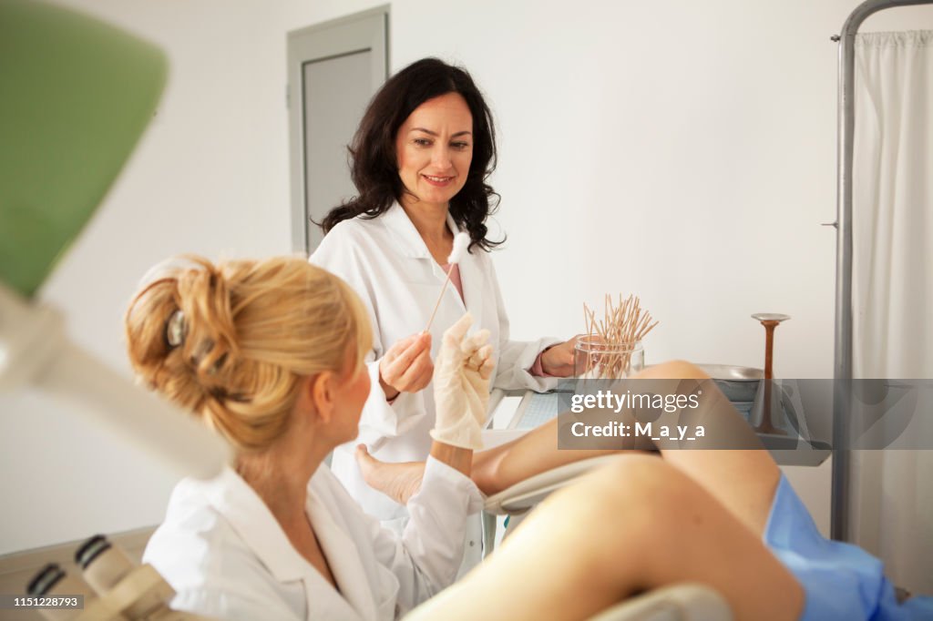 Gynaecologist examining a patient