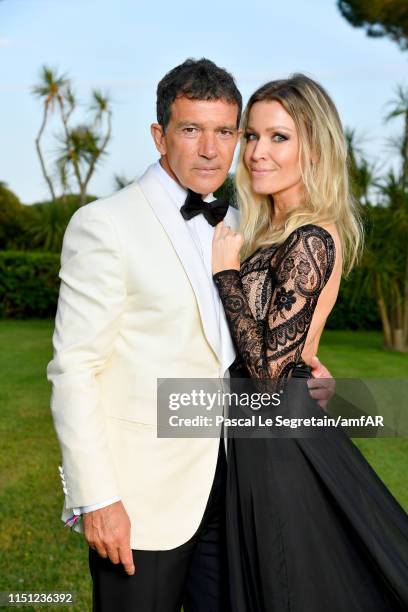 Antonio Banderas and Nicole Kimpel attend the amfAR Cannes Gala 2019 at Hotel du Cap-Eden-Roc on May 23, 2019 in Cap d'Antibes, France.