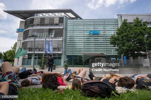 More than hundred activists of Fridays for Future and Extinction Rebellion made a Die In front of the HQ of the Christian Social Union in Munich,...