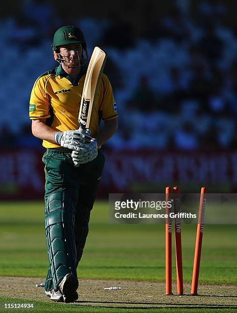 Rikki Wessels of Nottinghamshire is bowled for 30 runs by Jonathan Clare of Derbyshire during the Friends Life T20 match betwwen Nottinghamshire...