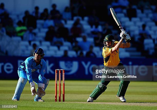 David Hussey of Nottinghamshire hits out to the boundary during the Friends Life T20 match betwwen Nottinghamshire Outlaws and Derbyshire Falcons at...