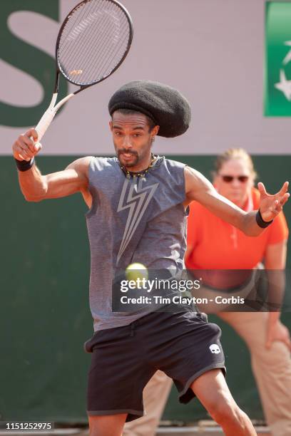 May 23. Dustin Brown of Germany in action against Salvatore Caruso of Italy on court seven during the qualifying tournament at the 2019 French Open...