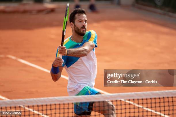 May 23. Salvatore Caruso of Italy in action against Dustin Brown of Germany on court seven during the qualifying tournament at the 2019 French Open...