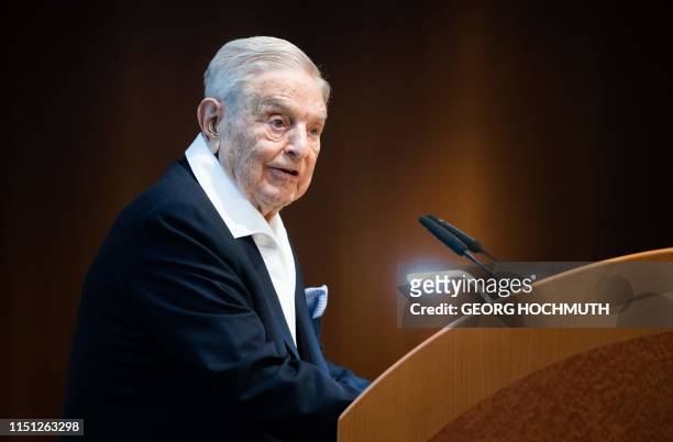 Hungarian-born US investor and philanthropist George Soros talks to the audience after receiving the Schumpeter Award 2019 in Vienna, Austria on June...