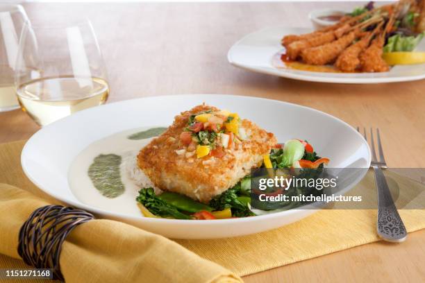 macadamia nut encrusted mahi - fried fish stock pictures, royalty-free photos & images