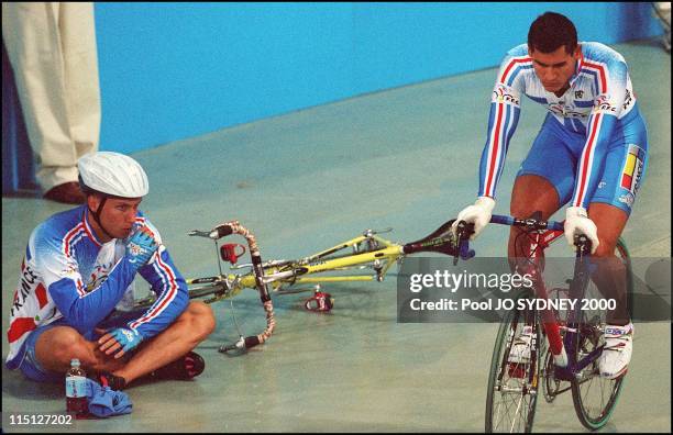 Sydney Olympics: cycling track-men's individual pursuit final in Sydney, Australia on September 20, 2000 - 2nd Florian Rousseau , 4th Laurent Gane .