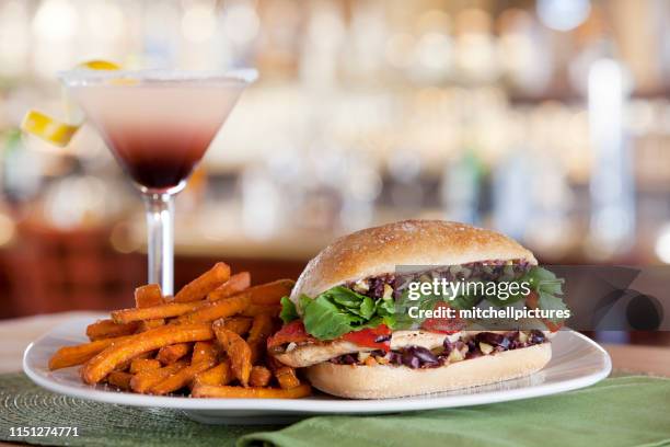 mediterranean chicken sandwich - sweet potato fries stock pictures, royalty-free photos & images