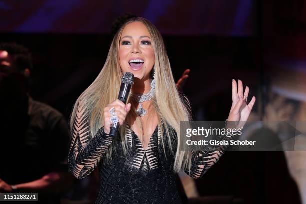 Mariah Carey performs at the amfAR Cannes Gala 2019 at Hotel du Cap-Eden-Roc on May 23, 2019 in Cap d'Antibes, France.