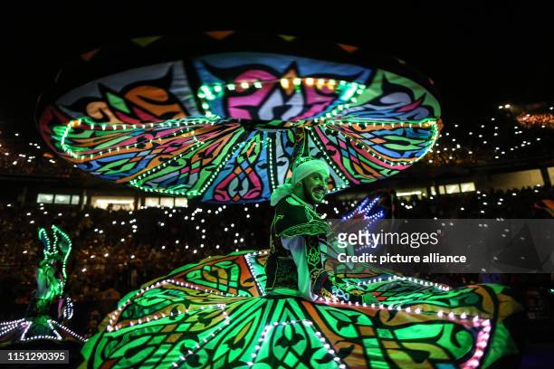 June 2019, Egypt, Cairo: An Egyptian traditional Tanoura dancer performs during the opening ceremony of the 2019 Africa Cup of Nations at the Cairo...