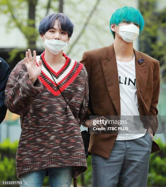 Group members Suga and Kim Tae-Hyung shot before rehearsals for KBS 2TV's "Music Bank" at KBS' new hall in Yeouido, Seoul, on April 19, 2019 in...