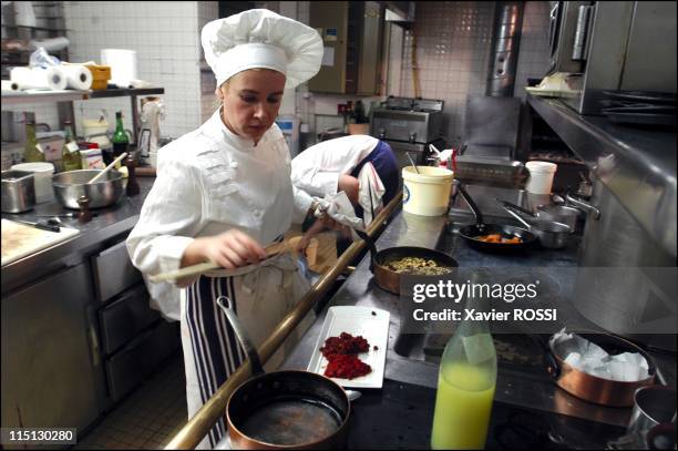 French chef Helene Darroze awarded 2 stars in the 2003 Michelin guide in Paris, France in February, 2003 - In her kitchen at rush hour. She has a...