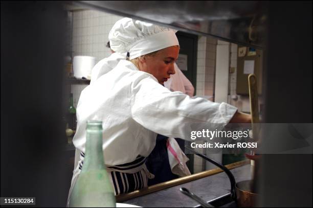 French chef Helene Darroze awarded 2 stars in the 2003 Michelin guide in Paris, France in February, 2003 - In her kitchen at rush hour. She has a...