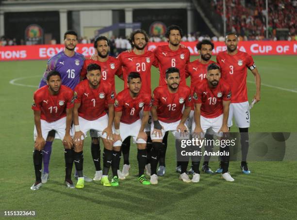 Players of Egypt pose for a photo ahead of the opening football match of the 2019 Africa Cup of Nations Group A match between Egypt and Zimbabwe at...