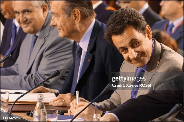 Consultations Franco-Italiennes in Paris, France on July 02, 2004 - From left to right: Jean-Pierre Raffarin, Jacques Chirac, Nicolas Sarkozy.