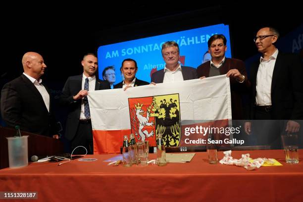 Alternative for Germany political party members Sebastian Wippel , Tino Chrupalla , Joerg Meuthen and Maximilian Krah pose with a Silesian flag at an...