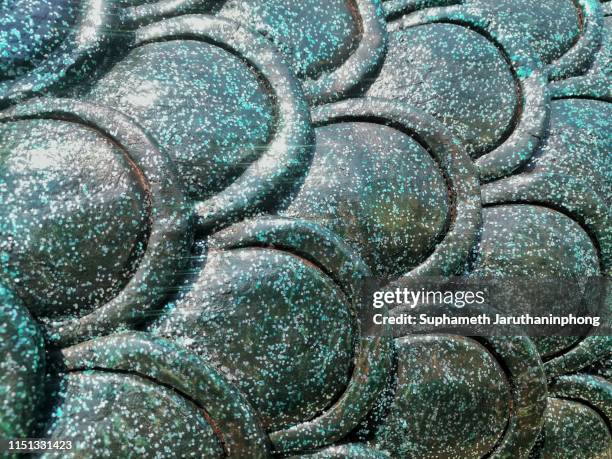 green ceramic fish scale. - animal scale stock-fotos und bilder