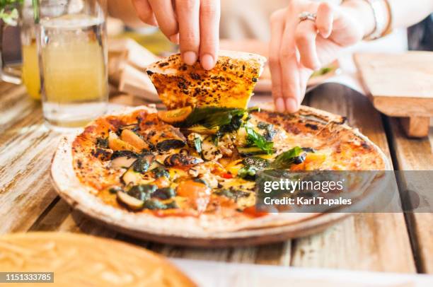 pesto and mushroom pizza - vegetarian pizza stock pictures, royalty-free photos & images