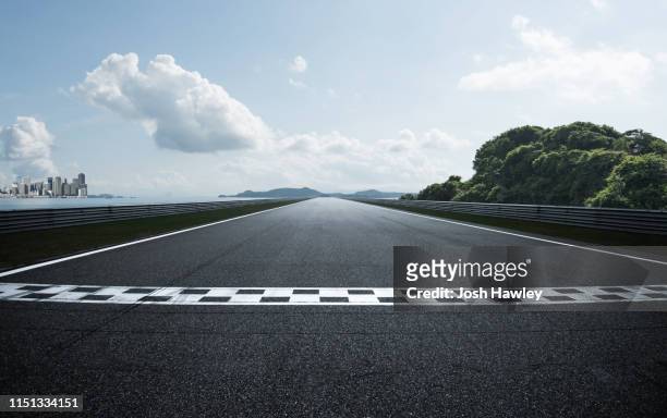 asphalt  road - race track stock-fotos und bilder