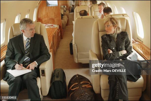 Bernard Arnault on board his private jet between Beijing and Shanghai. In Shanghai, China on October 11, 2004 - Bernard Arnault and his wife in...