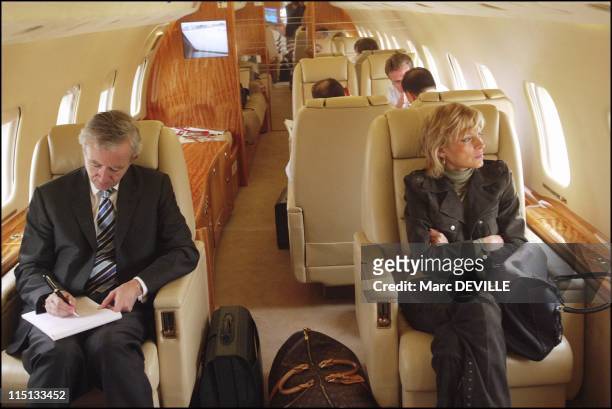 Bernard Arnault on board his private jet between Beijing and Shanghai. In Shanghai, China on October 11, 2004 - Bernard Aranult and his wife in...