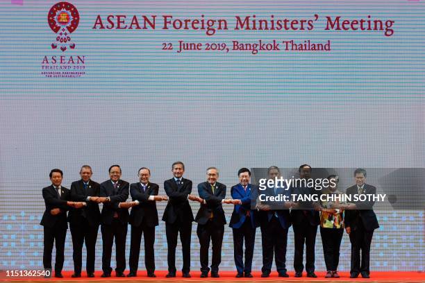Foreign ministers of the Association of Southeast Asian Nations from left, Laos Foreign Minister Saleumxay Kommasith, Malaysia Foreign Minister...