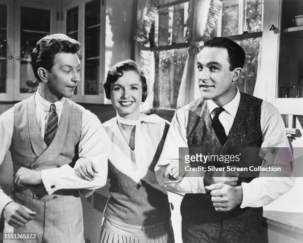 From left to right, actors Donald O'Connor, Debbie Reynolds and Gene Kelly in the 'Good Morning' sequence from the musical film 'Singin' in the...
