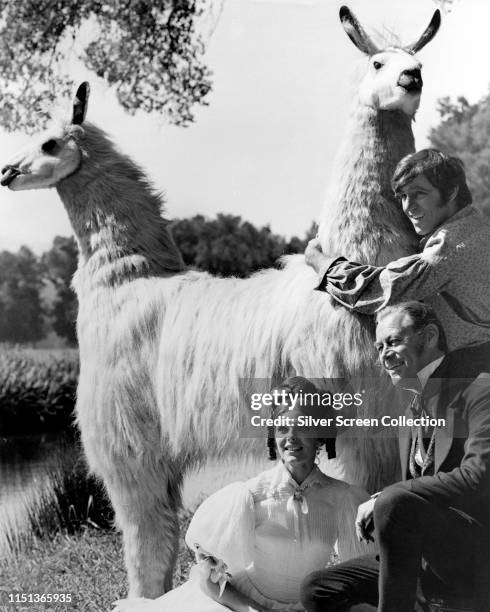 From left to right, actors Samantha Eggar as Emma Fairfax, Rex Harrison as Dr. John Dolittle, and Anthony Newley as Matthew Mugg in the musical film...