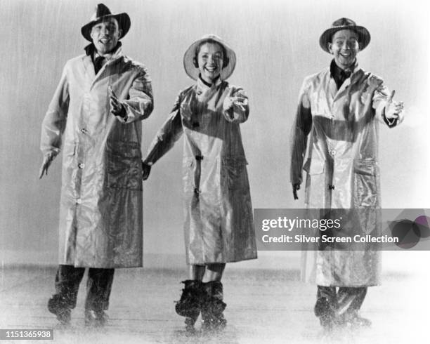 From left to right, actors and singers Gene Kelly, Debbie Reynolds and Donald O'Connor in the musical film 'Singin' in the Rain', 1952.