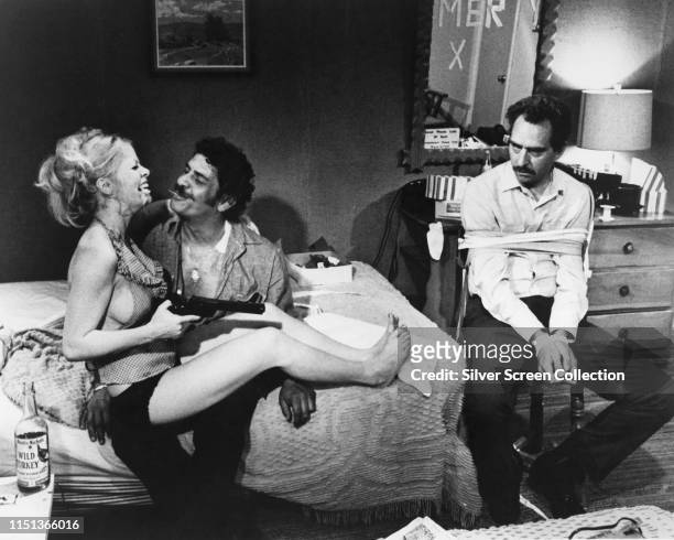 From left to right, Sally Struthers as Fran Clinton, Al Lettieri as Rudy Butler, and Jack Dodson as Harold Clinton in the film 'The Getaway', 1972.
