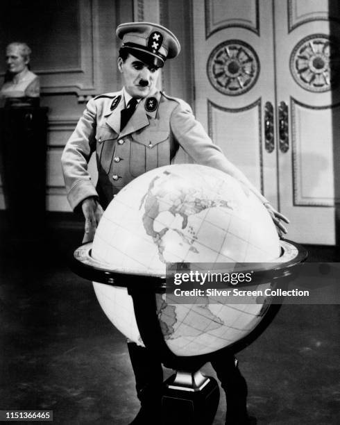 English actor and filmmaker Charlie Chaplin as Adenoid Hynkel, Dictator of Tomainia, in the film 'The Great Dictator', 1940.