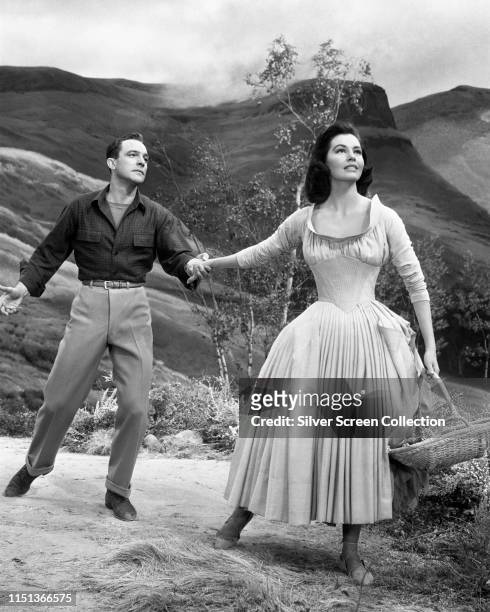 Actors Gene Kelly as Tommy Albright and Cyd Charisse as Fiona Campbell in the musical film 'Brigadoon', 1954.