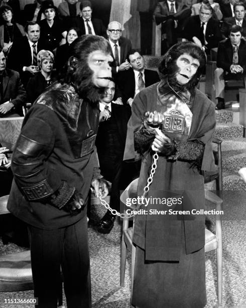 Actors Roddy McDowall as Cornelius and Kim Hunter as Zira in the science fiction film 'Escape from the Planet of the Apes', 1971.