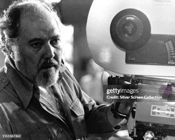 American film director Robert Altman behind the camera, circa 1970.