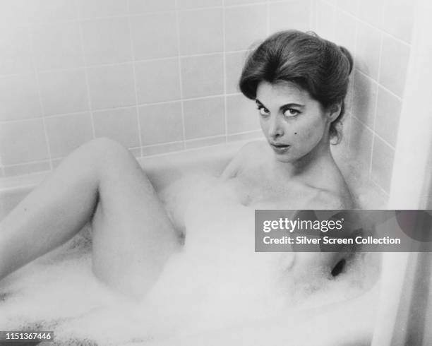 American actress Tina Louise in the bath, circa 1965.
