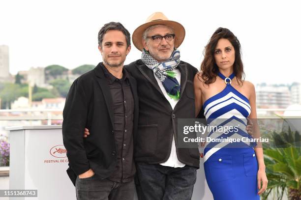 Gael García Bernal, Director Elia Suleiman and Yasmine Hamdan attend the photocall for "It Must Be Heaven" during the 72nd annual Cannes Film...