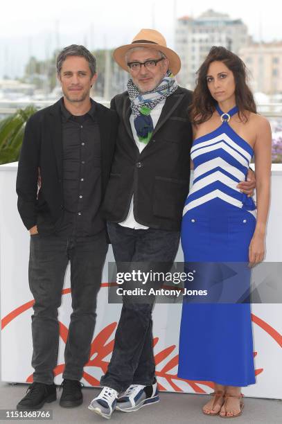 Gael García Bernal, Director Elia Suleiman and Yasmine Hamdan attend the photocall for "It Must Be Heaven" during the 72nd annual Cannes Film...