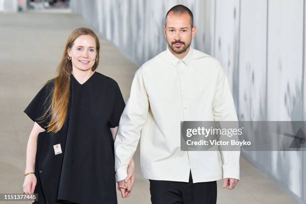 Lucie Meier and Luke Meier walk the runway during the finale of the Jil Sander Menswear Spring Summer 2020 show as part of Paris Fashion Week on June...