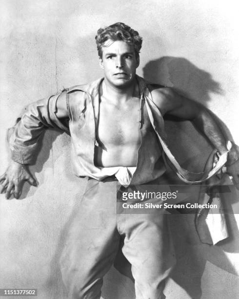 American actor and swimmer Buster Crabbe as the eponymous hero of the Universal serial film 'Buck Rogers', 1939.