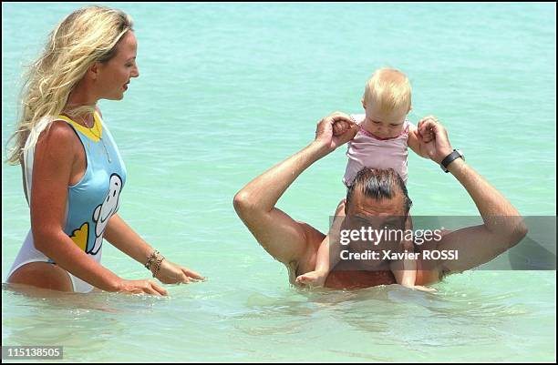 Prince Charles and wife Camilla of Bourbon Siciles with daughter Maria Carolina in Grand Baie, Mauritius island on January 30, 2004.