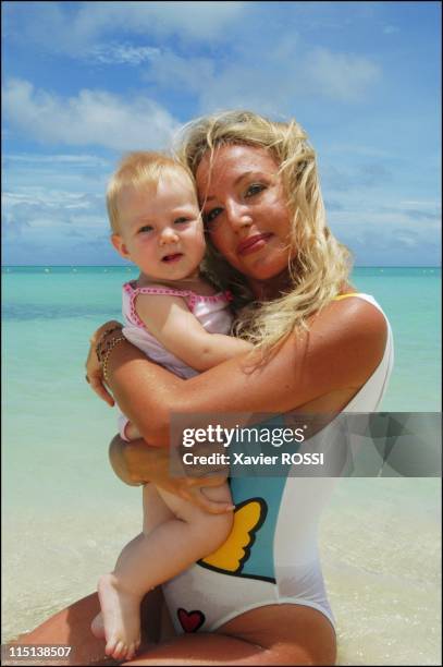 Prince Charles and wife Camilla of Bourbon Siciles with daughter Maria Carolina in Grand Baie, Mauritius island on January 30, 2004.