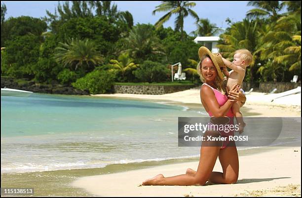 Prince Charles and wife Camilla of Bourbon Siciles with daughter Maria Carolina in Grand Baie, Mauritius island on January 30, 2004.