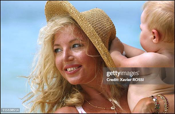 Prince Charles and wife Camilla of Bourbon Siciles with daughter Maria Carolina in Grand Baie, Mauritius island on January 30, 2004.