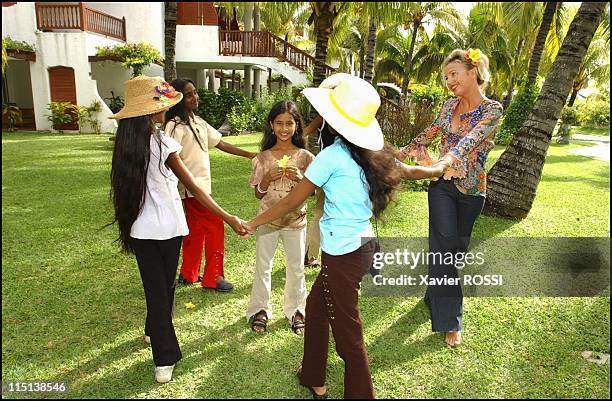 Prince Charles and wife Camilla of Bourbon Siciles with daughter Maria Carolina in Grand Baie, Mauritius island on January 30, 2004.