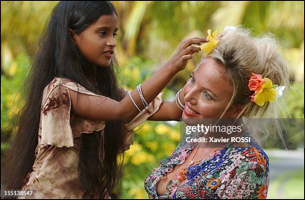 Prince Charles and wife Camilla of Bourbon Siciles with daughter Maria Carolina in Grand Baie, Mauritius island on January 30, 2004.